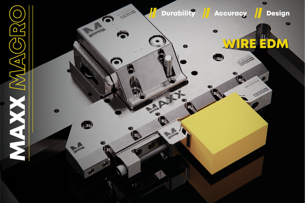 MAXX MACRO Wire EDM machine with a yellow block on a black background